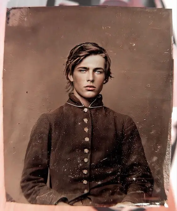 an old photo of a boy with hunter eyes